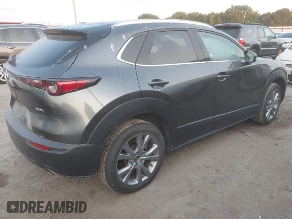 ✅ 2023 Mazda CX-30 S Premium • VIN: 3MVDMBDM4PM526636 • Lot: 42945074. Listed on IAAI with 50,441 mi. Free auction sales archive from the USA and detailed vehicle history report at DreamBid. Image 4.