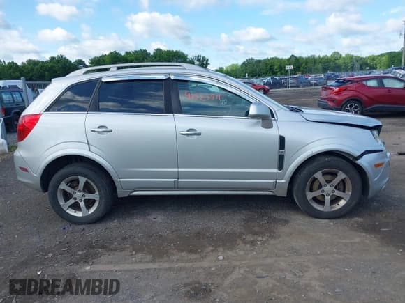 ✅ 2014 Chevrolet Captiva Sport LT • VIN: 3GNAL3EKXES542902 • Lot: 42523511. Wystawiony na IAAI z przebiegiem 172 472 mil. Bezpłatny archiwum sprzedaży aukcyjnych z USA i szczegółowy raport historii pojazdu na DreamBid. Zdjęcie 13.