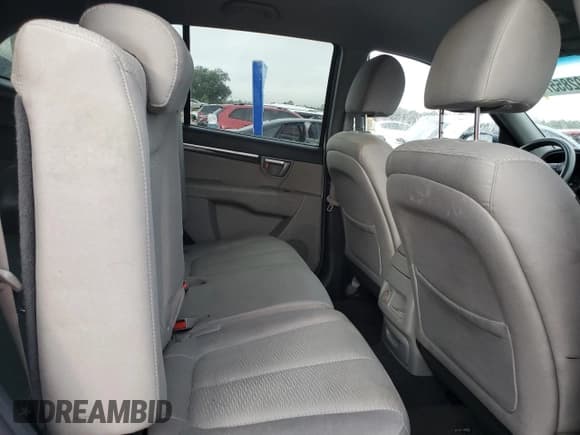✅ 2009 Hyundai Santa Fe GLS • VIN: 5NMSG13D69H300311 • Lot: 79285574. Listed on Copart with 412,959 mi. Free auction sales archive from the USA and detailed vehicle history report at DreamBid. Image 11.