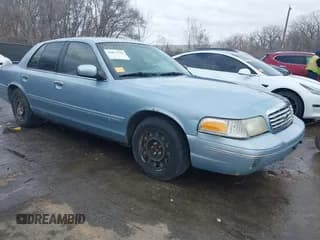 ✅ 2003 Ford Crown Victoria Standard • VIN: 2FAFP73W83X154921 • Lot: 41073184. Listed on IAAI with 190,093 mi. Free auction sales archive from the USA and detailed vehicle history report at DreamBid. Image 1.