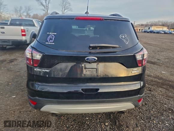 ✅ 2018 Ford Escape SE • VIN: 1FMCU9GD3JUC25422 • Lot: 95835625. Wystawiony na Copart z przebiegiem 93 399 mil. Bezpłatny archiwum sprzedaży aukcyjnych z USA i szczegółowy raport historii pojazdu na DreamBid. Zdjęcie 6.