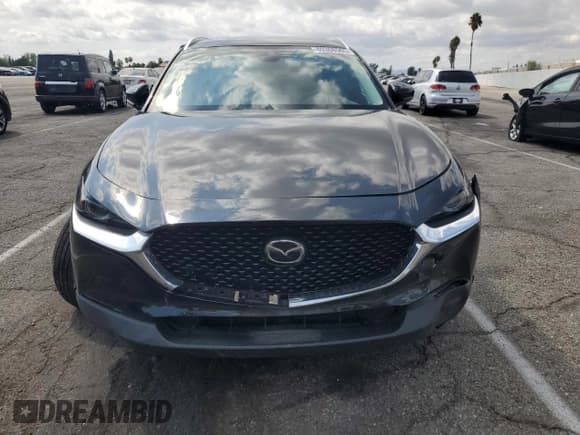 ✅ 2023 Mazda CX-30 Premium • VIN: 3MVDMBDY2PM503035 • Lot: 80368565. Wystawiony na Copart z przebiegiem 51 174 mil. Bezpłatny archiwum sprzedaży aukcyjnych z USA i szczegółowy raport historii pojazdu na DreamBid. Zdjęcie 5.