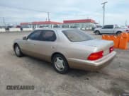 ✅ 1998 Lexus LS 400 • VIN: JT8BH28FXW0127870 • Лот: 43790435. Опубликован ранее на IAAI с пробегом 176 117 миль. Бесплатный доступ к архиву аукционных продаж из США и подробный отчёт об истории автомобиля на DreamBid. Изображение 3.