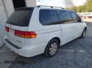 ✅ 2003 Honda Odyssey EX-L • VIN: 5FNRL18033B031659 • Lot: 43485510. Listed on IAAI with 198,875 mi. Free auction sales archive from the USA and detailed vehicle history report at DreamBid. Image 4.