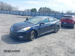 ✅ 2013 Hyundai Azera • VIN: KMHFH4JG6DA233205 • Лот: 41643389. Опубликован ранее на IAAI с пробегом 200 842 миль. Бесплатный доступ к архиву аукционных продаж из США и подробный отчёт об истории автомобиля на DreamBid. Изображение 2.