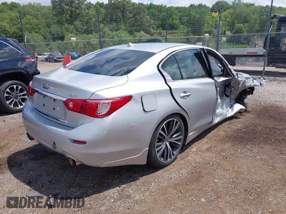 ✅ 2014 Infiniti Q50 Hybrid Premium • VIN: JN1AV7AR5EM702801 • Lot: 42616986. Listed on IAAI with 101,847 mi. Free auction sales archive from the USA and detailed vehicle history report at DreamBid. Image 4.