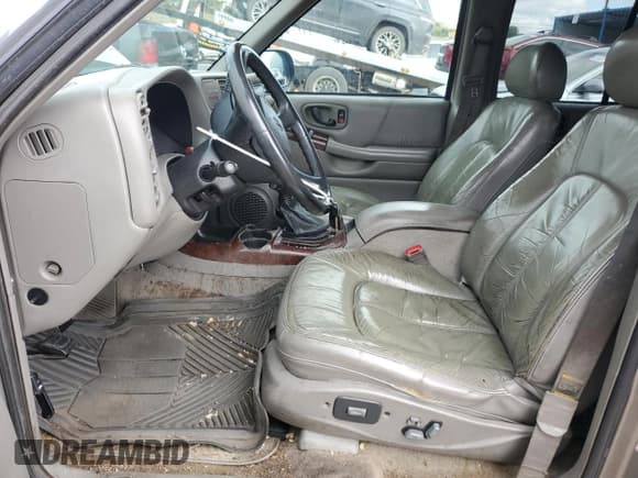 ✅ 1999 Oldsmobile Bravada • VIN: 1GHDT13W7X2720659 • Lot: 85552105. Wystawiony na Copart z przebiegiem 206 014 mil. Bezpłatny archiwum sprzedaży aukcyjnych z USA i szczegółowy raport historii pojazdu na DreamBid. Zdjęcie 7.