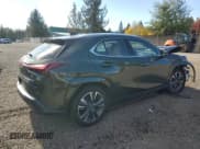 ✅ 2023 Lexus UX 250h Premium • VIN: JTHP9JBH4P2070403 • Lot: 86471555. Listed on Copart with 23,785 mi. Free auction sales archive from the USA and detailed vehicle history report at DreamBid. Image 3.