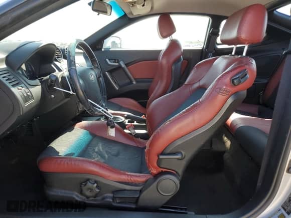 2008 Hyundai Tiburon GT z VIN KMHHN66F98U267849, wystawiony jako Copart lot #88506815 z przebiegiem 92 820 mil mil oraz Szkoda całkowita • Salvage title. Historia ofert i sprzedaży dostępna na DreamBid. Obrazek 7.