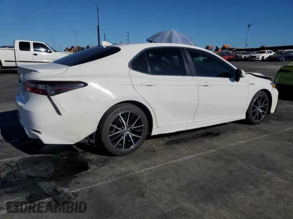 2021 Toyota Camry Hybrid SE с VIN 4T1S31AK0MU023567, выставлен на аукционе Copart как лот 71823315 с пробегом 331 948 миль миль и Списание • Salvage title. История ставок и продаж доступна на DreamBid. Изображение 3.