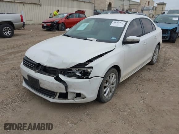 ✅ 2013 Volkswagen Jetta SE • VIN: 3VWDX7AJ9DM351857 • Lot: 43766161. Listed on IAAI with 216,950 mi. Free auction sales archive from the USA and detailed vehicle history report at DreamBid. Image 2.