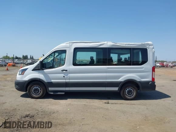 ✅ 2023 Ford Transit Passenger XL • VIN: 1FBAX2CG7PKC04821 • Lot: 42379783. Listed on IAAI with 15,909 mi. Free auction sales archive from the USA and detailed vehicle history report at DreamBid. Image 14.