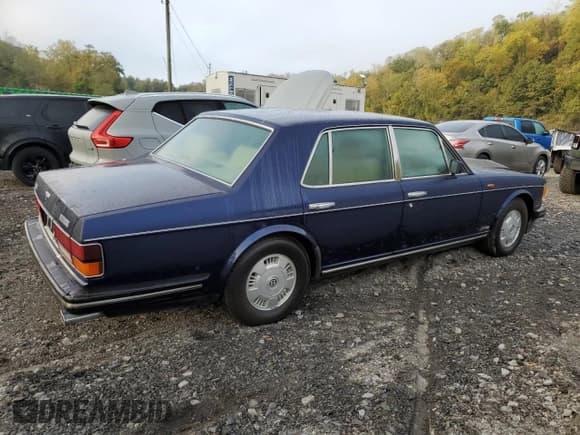 ✅ 1994 Bentley Brooklands • VIN: SCBZE02C5RCX54428 • Lot: 83754774. Wystawiony na Copart z przebiegiem 57 417 mil. Bezpłatny archiwum sprzedaży aukcyjnych z USA i szczegółowy raport historii pojazdu na DreamBid. Zdjęcie 3.