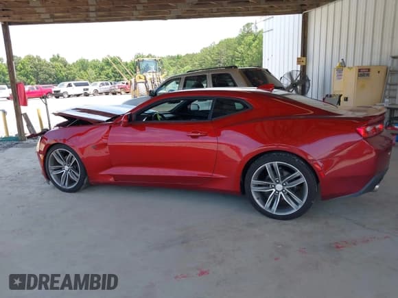 ✅ 2016 Chevrolet Camaro 1LT • VIN: 1G1FA1RX8G0158635 • Lot: 42331267. Listed on IAAI with 47,643 mi. Free auction sales archive from the USA and detailed vehicle history report at DreamBid. Image 14.
