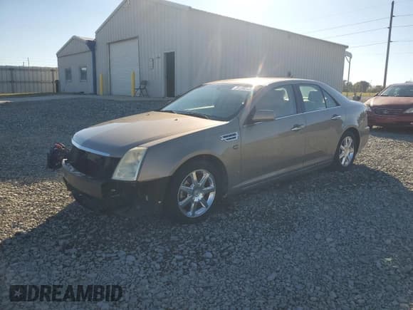 ✅ 2008 Cadillac STS RWD • VIN: 1G6DW67V080138074 • Lot: 91199245. Listed on Copart with 125,034 mi. Free auction sales archive from the USA and detailed vehicle history report at DreamBid. Image 1.