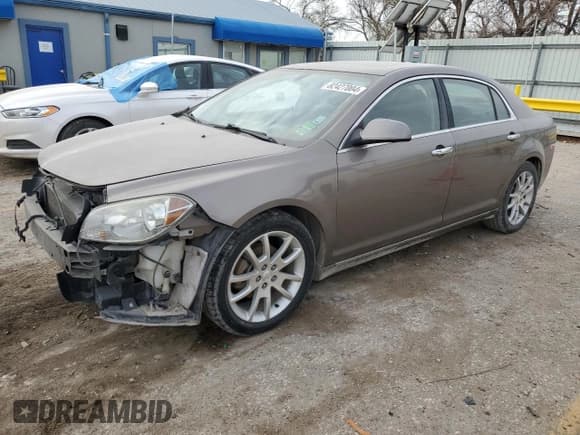 ✅ 2012 Chevrolet Malibu LTZ • VIN: 1G1ZE5EU7CF157570 • Lot: 82427004. Listed on Copart with 152,932 mi. Free auction sales archive from the USA and detailed vehicle history report at DreamBid. Image 1.