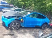 ✅ 2022 Ford Mustang Mach-E Premium • VIN: 3FMTK3R77NMA28340 • Lot: 42233063. Listed on IAAI with 22,893 mi. Free auction sales archive from the USA and detailed vehicle history report at DreamBid. Image 15.