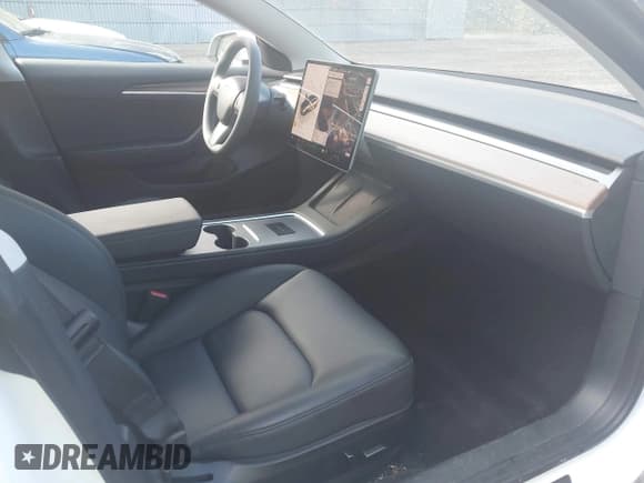 ✅ 2023 Tesla Model 3 • VIN: 5YJ3E1EA9PF576610 • Lot: 42206777. Listed on IAAI with 21,658 mi. Free auction sales archive from the USA and detailed vehicle history report at DreamBid. Image 5.