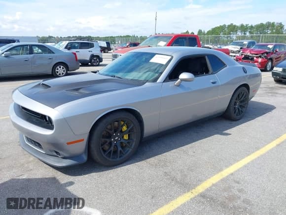 ✅ 2017 Dodge Challenger 392 Hemi Scat Pack Shaker • VIN: 2C3CDZFJ0HH594042 • Lot: 43394665. Listed on IAAI with 93,166 mi. Free auction sales archive from the USA and detailed vehicle history report at DreamBid. Image 2.