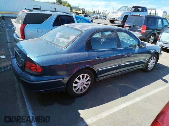 2002 Hyundai Sonata GLS с VIN KMHWF35H12A702457, выставлен на аукционе Copart как лот 60985574 с пробегом 99 698 миль миль и Списание • Salvage title. История ставок и продаж доступна на DreamBid. Изображение 3.