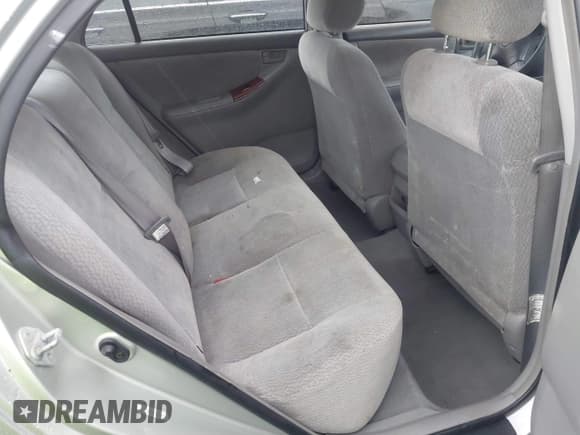 ✅ 2003 Toyota Corolla CE • VIN: JTDBR32E130005852 • Lot: 43488589. Listed on IAAI with 127,736 mi. Free auction sales archive from the USA and detailed vehicle history report at DreamBid. Image 8.