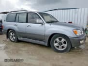 ✅ 2001 Lexus LX 470 • VIN: JTJHT00W313508801 • Lot: 62773925. Listed on Copart with 118,013 mi. Free auction sales archive from the USA and detailed vehicle history report at DreamBid. Image 4.