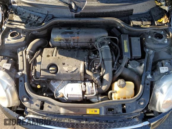 ✅ 2012 MINI Clubman S • VIN: WMWZG3C50CTY38041 • Lot: 91230425. Wystawiony na Copart z przebiegiem 127 859 mil. Bezpłatny archiwum sprzedaży aukcyjnych z USA i szczegółowy raport historii pojazdu na DreamBid. Zdjęcie 11.