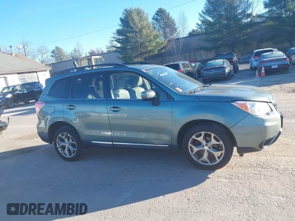 ✅ 2015 Subaru Forester Touring • VIN: JF2SJAUC7FH588703 • Lot: 43680535. Listed on IAAI with 234,995 mi. Free auction sales archive from the USA and detailed vehicle history report at DreamBid. Image 13.