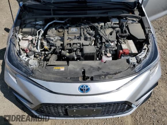 ✅ 2024 Toyota Corolla Hybrid LE • VIN: JTDBDMHE8RJ005328 • Lot: 61131715. Listed on Copart with 31,177 mi. Free auction sales archive from the USA and detailed vehicle history report at DreamBid. Image 11.