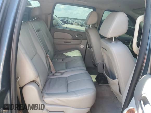 2008 Chevrolet Suburban LT с VIN 1GNFC16078J245227, выставлен на аукционе Copart как лот 72221724 с пробегом 169 519 миль миль и Списание • Salvage title. История ставок и продаж доступна на DreamBid. Изображение 11.