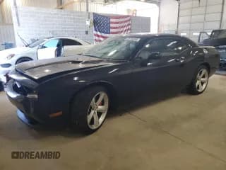 ✅ 2009 Dodge Challenger SRT-8 • VIN: 2B3LJ74W29H590598 • Lot: 69135265. Wystawiony na Copart z przebiegiem 30 542 mil. Bezpłatny archiwum sprzedaży aukcyjnych z USA i szczegółowy raport historii pojazdu na DreamBid. Zdjęcie 1.
