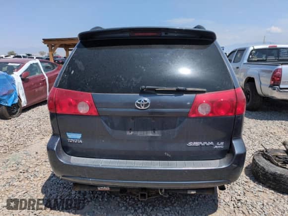 2009 Toyota Sienna LE with VIN 5TDBK23C09S023602, listed as a Copart auction lot 65241605 with 214,661 mi miles and Clean title. Bid and sale history available at DreamBid. Image 6.