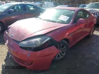 2008 Hyundai Tiburon GS z VIN KMHHM66D58U282754, wystawiony jako IAAI lot #41413249 z przebiegiem 134 052 mil mil oraz . Historia ofert i sprzedaży dostępna na DreamBid. Obrazek 2.