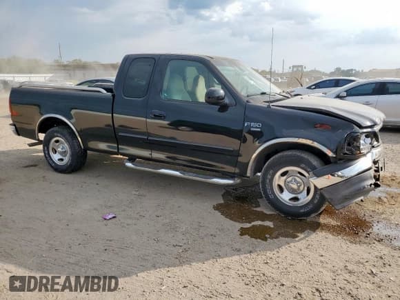 ✅ 1999 Ford F-150 • VIN: 1FTRX17W3XNB91574 • Lot: 84773145. Listed on Copart with Not provided. Free auction sales archive from the USA and detailed vehicle history report at DreamBid. Image 4.