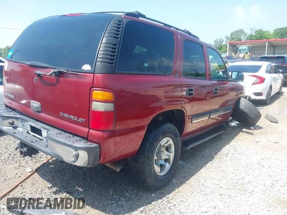 2001 Chevrolet Tahoe LT z VIN 1GNEK13T01R220304, wystawiony jako IAAI lot #42322561 z przebiegiem 139 197 mil mil oraz . Historia ofert i sprzedaży dostępna na DreamBid. Obrazek 4.