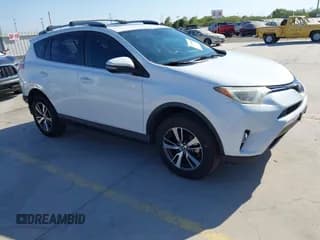 ✅ 2018 Toyota RAV4 XLE • VIN: JTMWFREV2JD132897 • Lot: 43310664. Listed on IAAI with 96,612 mi. Free auction sales archive from the USA and detailed vehicle history report at DreamBid. Image 1.
