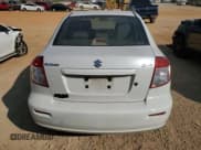 ✅ 2013 Suzuki SX4 LE • VIN: JS2YC5A34D6102152 • Lot: 88760515. Wystawiony na Copart z przebiegiem 107 764 mil. Bezpłatny archiwum sprzedaży aukcyjnych z USA i szczegółowy raport historii pojazdu na DreamBid. Zdjęcie 6.