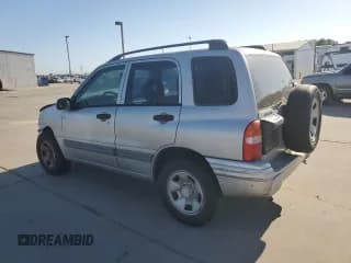 ✅ 2003 Suzuki Vitara • VIN: 2S3TE52V136105762 • Лот: 54796825. Опубликован ранее на Copart с пробегом 164 564 миль. Бесплатный доступ к архиву аукционных продаж из США и подробный отчёт об истории автомобиля на DreamBid. Изображение 2.