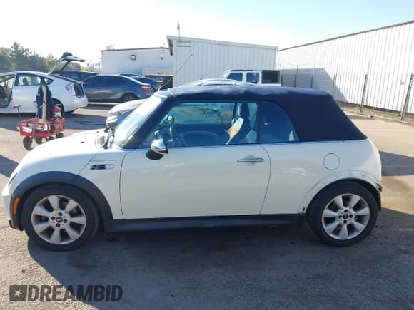 ✅ 2006 MINI Convertible S • VIN: WMWRH33556TK58950 • Lot: 43758981. Listed on IAAI with 76,278 mi. Free auction sales archive from the USA and detailed vehicle history report at DreamBid. Image 15.