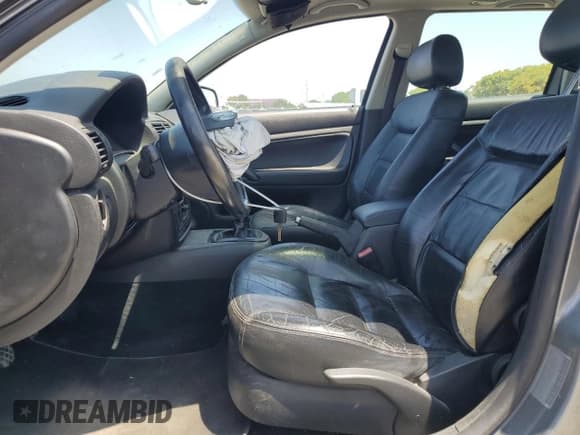 ✅ 2003 Volkswagen Passat GLS • VIN: WVWVD63B03E068400 • Лот: 60284485. Опубликован ранее на Copart с пробегом 242 868 миль. Бесплатный доступ к архиву аукционных продаж из США и подробный отчёт об истории автомобиля на DreamBid. Изображение 7.