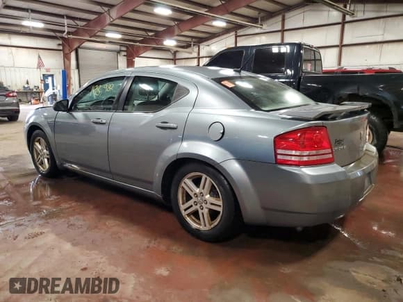 ✅ 2010 Dodge Avenger R/T • VIN: 1B3CC5FB0AN216236 • Лот: 77963664. Опубликован ранее на Copart с пробегом 198 982 миль. Бесплатный доступ к архиву аукционных продаж из США и подробный отчёт об истории автомобиля на DreamBid. Изображение 2.