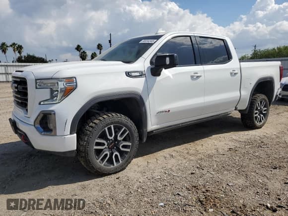 ✅ 2021 GMC Sierra 1500 AT4 • VIN: 3GTU9EET5MG404209 • Лот: 90034345. Опубликован ранее на Copart с пробегом 213 397 миль. Бесплатный доступ к архиву аукционных продаж из США и подробный отчёт об истории автомобиля на DreamBid. Изображение 1.