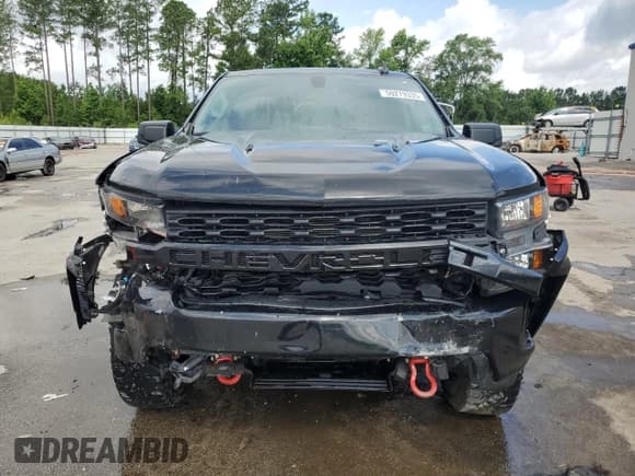 ✅ 2022 Chevrolet Silverado 1500 Custom Trail Boss • VIN: 3GCPYCEL1NG211884 • Lot: 59279335. Wystawiony na Copart z przebiegiem 26 869 mil. Bezpłatny archiwum sprzedaży aukcyjnych z USA i szczegółowy raport historii pojazdu na DreamBid. Zdjęcie 5.