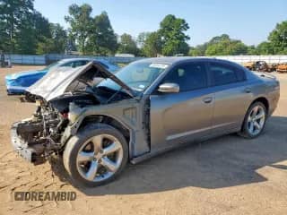 2012 Dodge Charger RT Plus with VIN 2C3CDXCT5CH140226, listed as a Copart auction lot 85094735 with 181,268 mi miles and Salvage title. Bid and sale history available at DreamBid. Image 1.