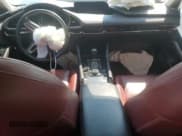 ✅ 2023 Mazda 3 S Carbon Edition • VIN: 3MZBPBCM1PM359098 • Лот: 67954915. Опубликован ранее на Copart с пробегом 65 844 миль. Бесплатный доступ к архиву аукционных продаж из США и подробный отчёт об истории автомобиля на DreamBid. Изображение 8.