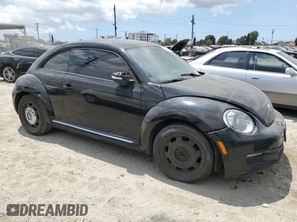 ✅ 2014 Volkswagen Beetle 1.8T • VIN: 3VWJ07AT6EM657490 • Lot: 56752285. Listed on Copart with Not provided. Free auction sales archive from the USA and detailed vehicle history report at DreamBid. Image 4.
