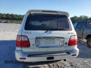 ✅ 2004 Lexus LX 470 • VIN: JTJHT00W143538044 • Lot: 69959325. Wystawiony na Copart z przebiegiem 200 046 mil. Bezpłatny archiwum sprzedaży aukcyjnych z USA i szczegółowy raport historii pojazdu na DreamBid. Zdjęcie 6.