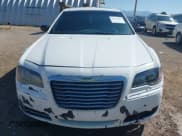 ✅ 2013 Chrysler 300 S • VIN: 2C3CCAGG5DH599657 • Lot: 42745453. Listed on IAAI with 211,351 mi. Free auction sales archive from the USA and detailed vehicle history report at DreamBid. Image 12.