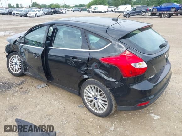 ✅ 2014 Ford Focus Titanium • VIN: 1FADP3N25EL194433 • Lot: 42512912. Listed on IAAI with 105,355 mi. Free auction sales archive from the USA and detailed vehicle history report at DreamBid. Image 3.