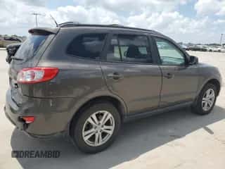 2012 Hyundai Santa Fe SE с VIN 5XYZHDAG2CG120223, выставлен на аукционе Copart как лот 63276544 с пробегом 113 300 миль миль и Чистый • Clean title. История ставок и продаж доступна на DreamBid. Изображение 3.